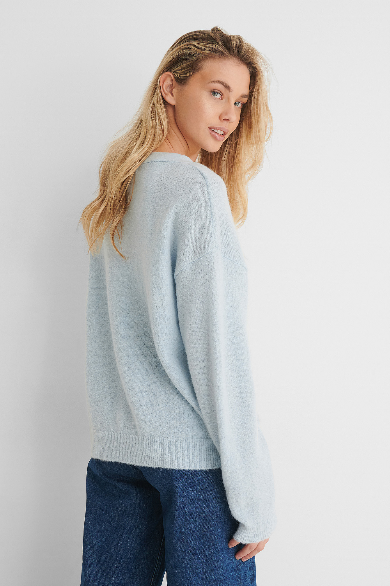 bright blue knitted jumper