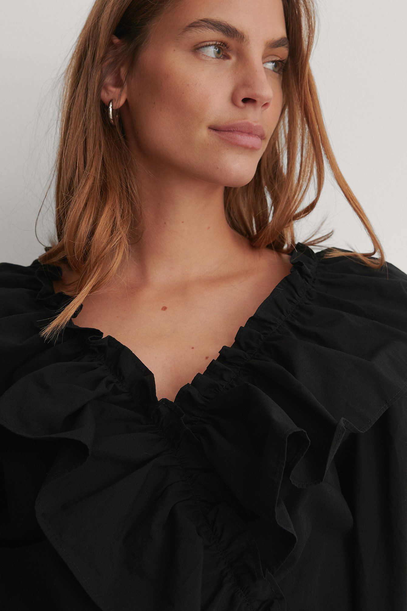 black with frilled neckline